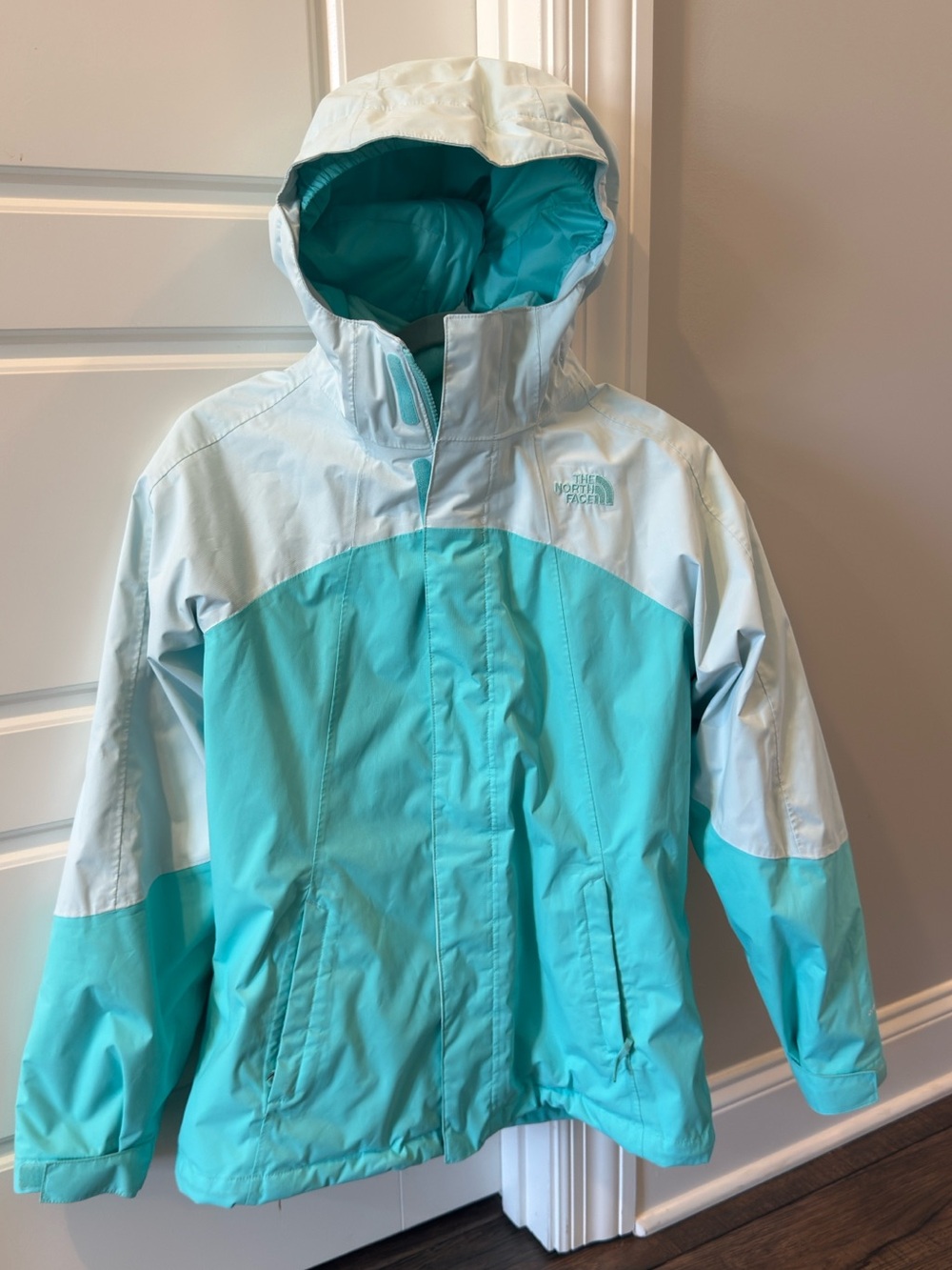 The North Face Teal & Light Blue Kids' Waterproof Dryvent TRI Climate coat.